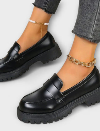 Minerva glossy platform penny loafers in Black
