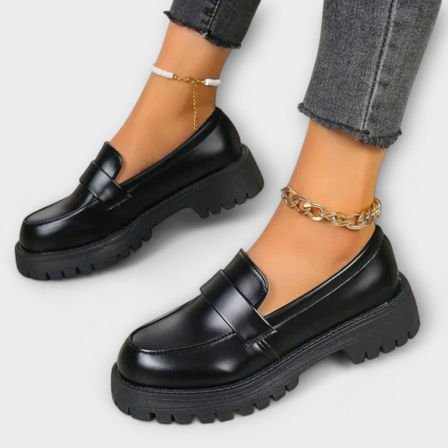 Minerva glossy platform penny loafers in Black