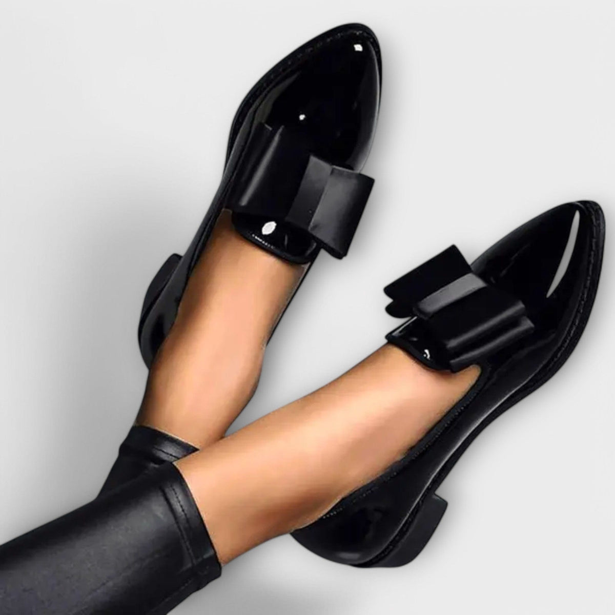 Winnie bow-front pointed loafers in Black