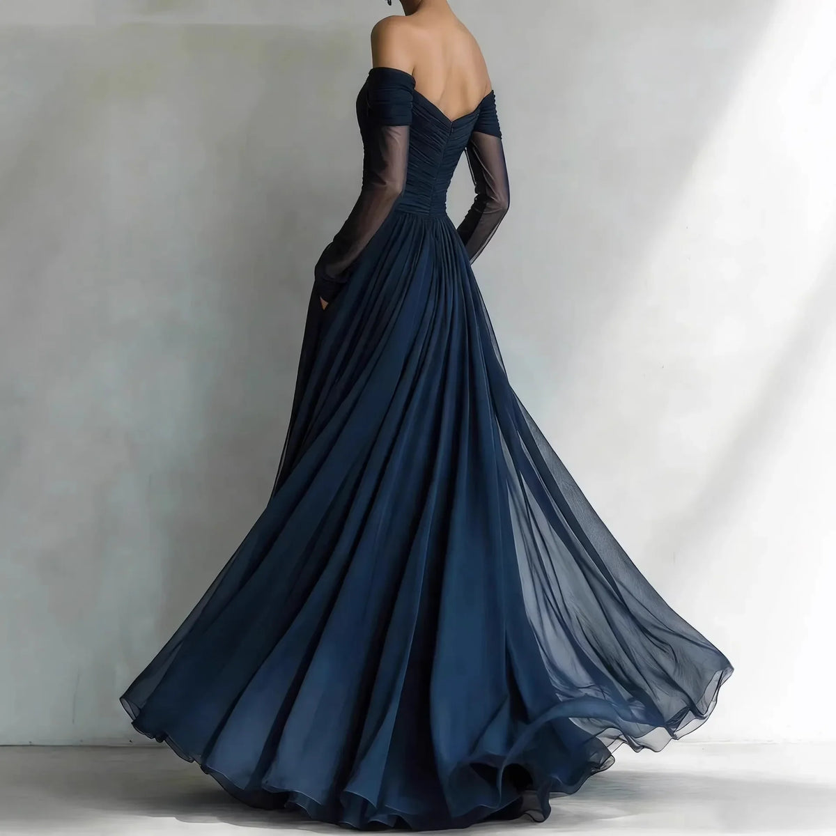 Scarlett | Navy tulle gown with off-shoulder sleeves and pleated skirt