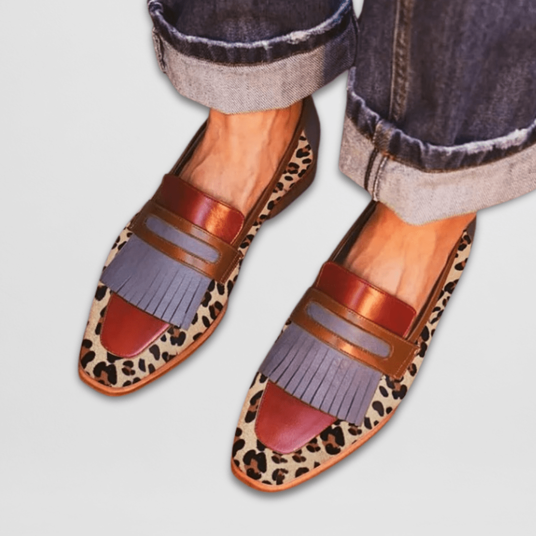 Fleur leopard fringe kiltie loafers in Cognac Leopard